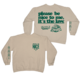 Beige sweatshirt with green text printed on the back.